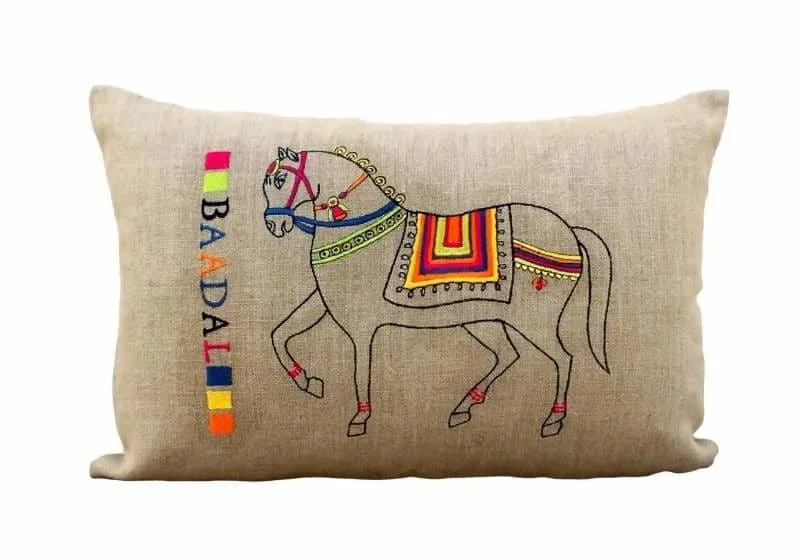 Linen pillow cover decorated with embroidered horse